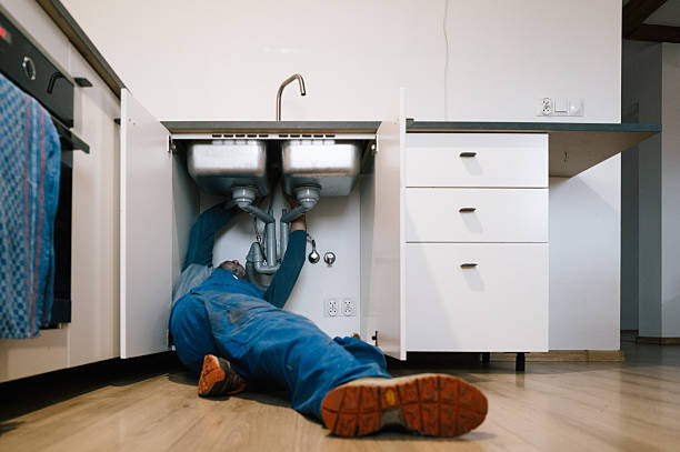 Professional Drain Cleaning technician working in Enfield, CT